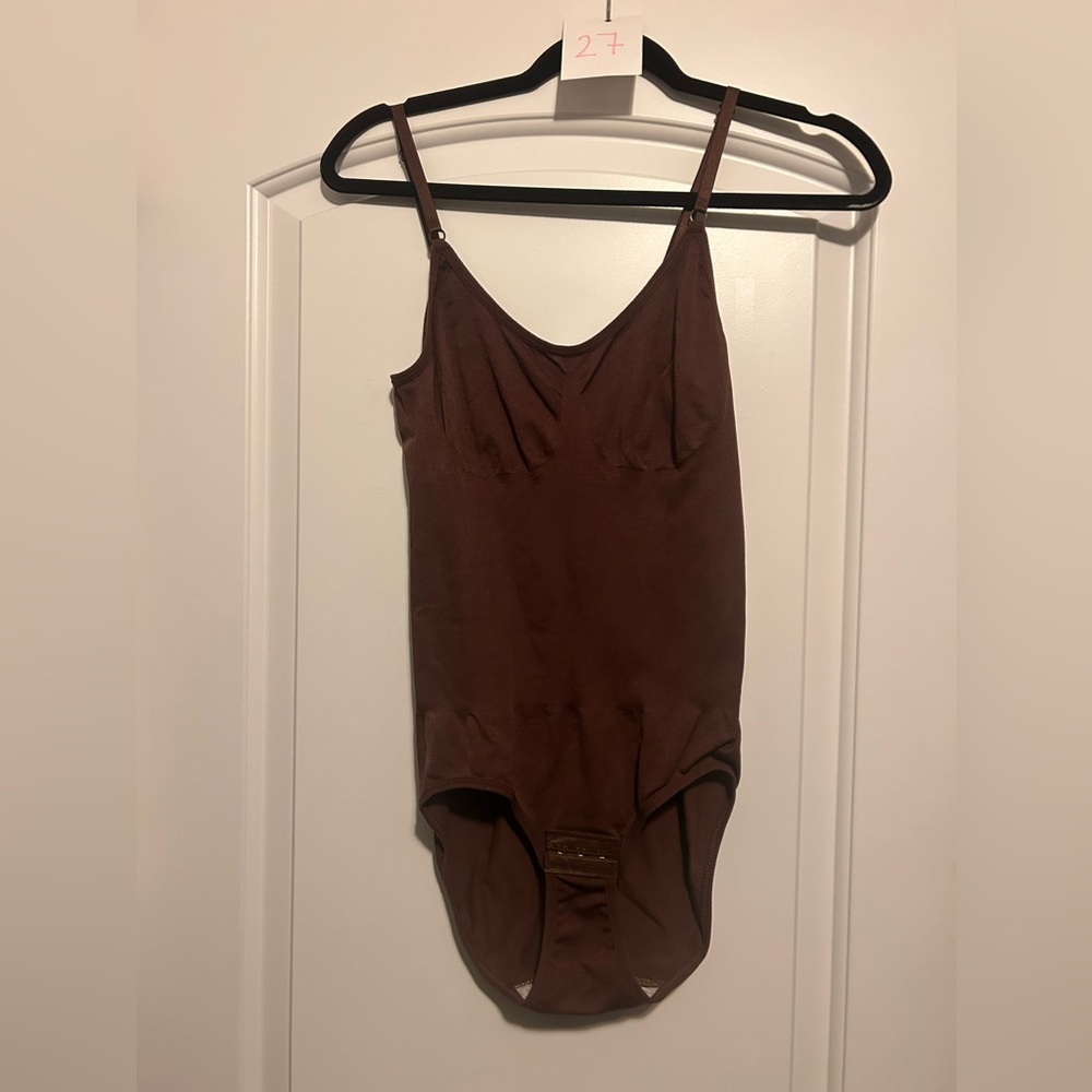 Women’s cinching Bodysuit, large extra large new without tags
